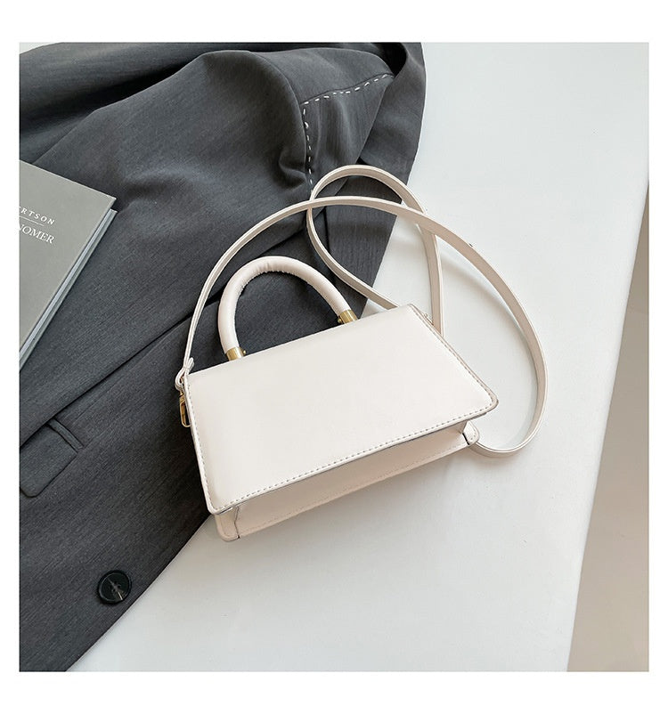 Spring Womens Commuter Light-Luxury Solid-Colored Crossbody Bag With Lock Closure